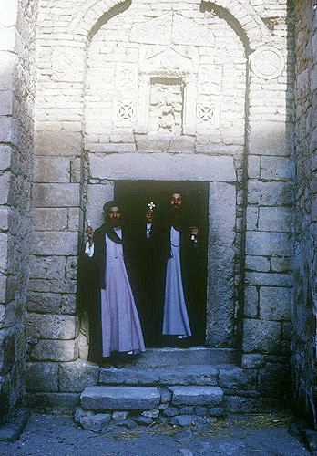 Coptic Monks in a desert monastery, Egypt